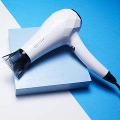 InStyler Turbo Ionic Blow Dryer in action delivering fast drying through high airflow.