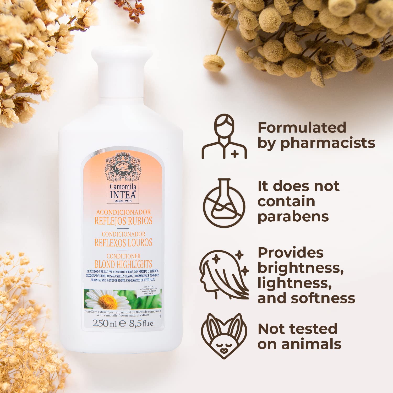 Applying Intea conditioner through hair for softness