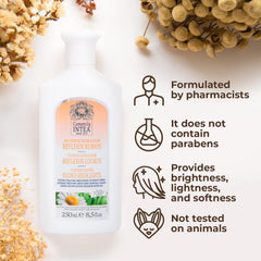 Applying Intea conditioner through hair for softness