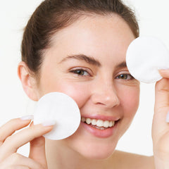 Intrinsics Premium Cotton Ovals wet-use pad for refreshing cleanse.
