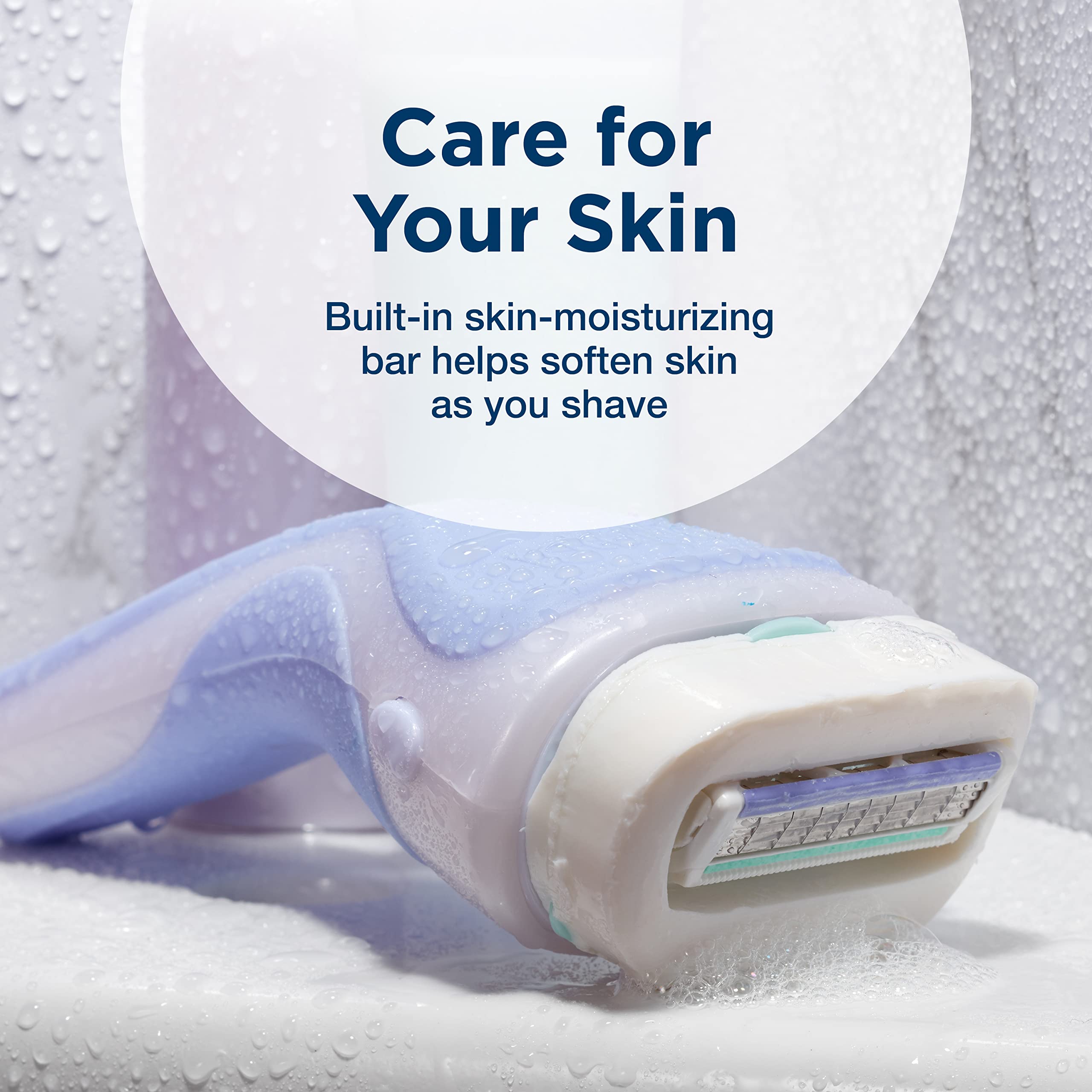 INTUITION four-blade cartridge closeup delivers a close, smooth shave with contour hugging.