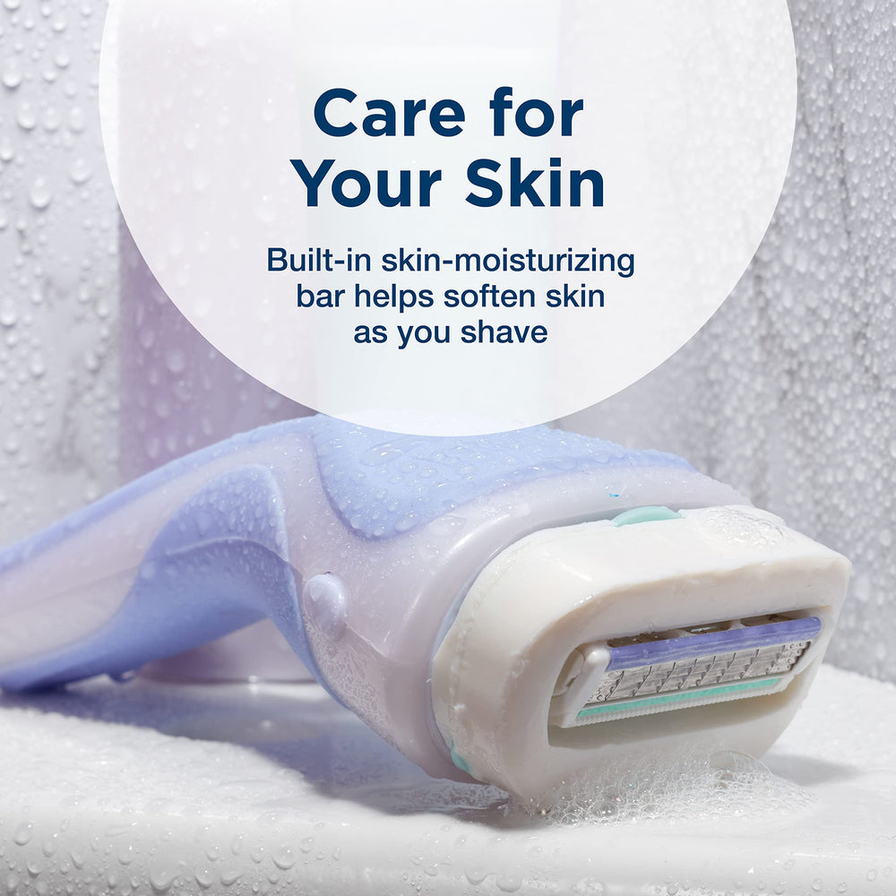 INTUITION four-blade cartridge closeup delivers a close, smooth shave with contour hugging.