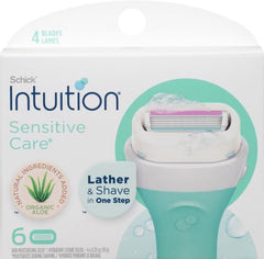 INTUITION Schick sensitive-care cartridge close-up highlighting 4 blades