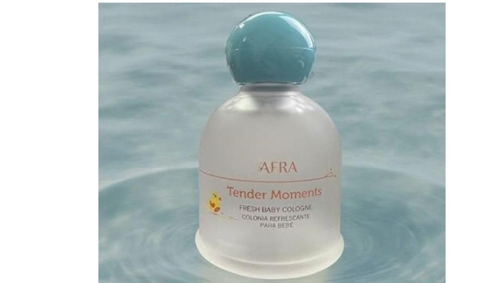Ioly's Tender Moments baby cologne being applied with a light mist