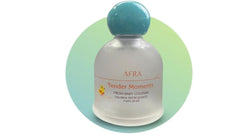 Ioly's Tender Moments bottle closeup with soft mist for after-bath refresh