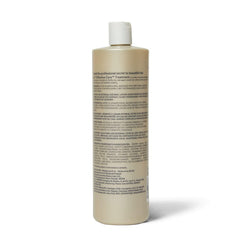 Ion Effective Care Treatment 338oz bottle close-up — creamy texture hints at hydration.