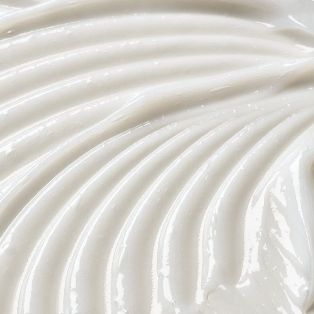 Ion Keratin Smoothing Shampoo foam close-up highlights creamy texture for gentle cleansing.