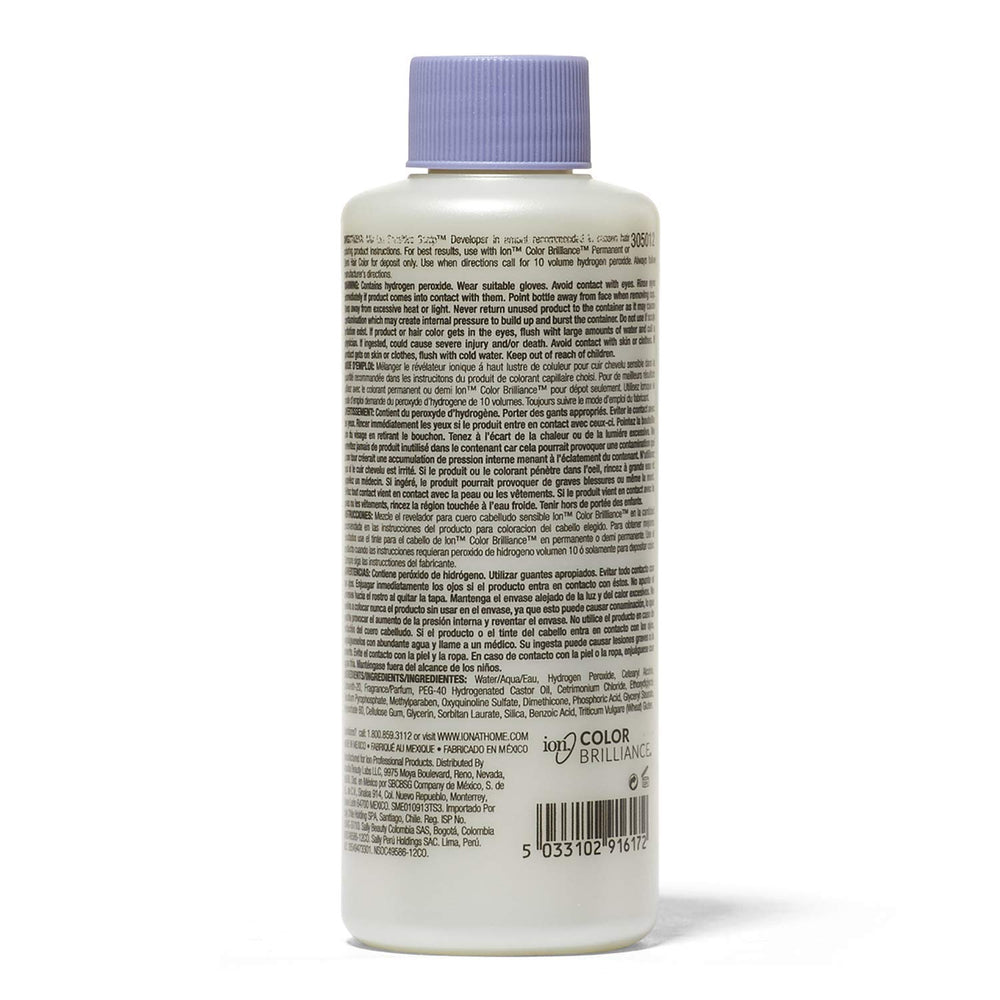 Ion Sensitive Scalp creme developer held in hand with refreshing fragrance and easy application