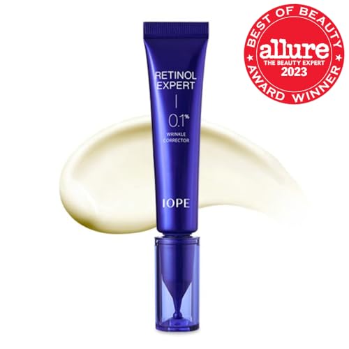 IOPE Retinol Expert dropper delivering precise pea-sized doses for safe nightly use.