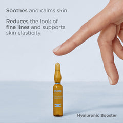 ISDIN Isdinceutics booster ampoule label close-up highlighting hyaluronic acid and peptides.