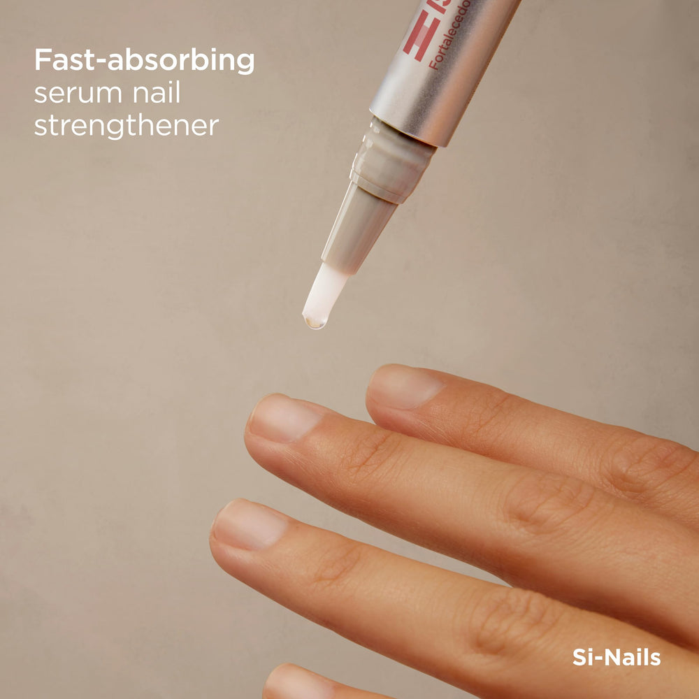 ISDIN Si-Nails application closeup demonstrates smooth brush-on use.