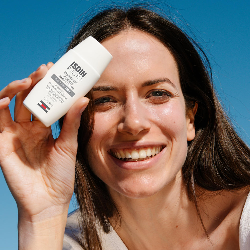 ISDIN SPF50 mineral sunscreen on the face with breathable coverage.