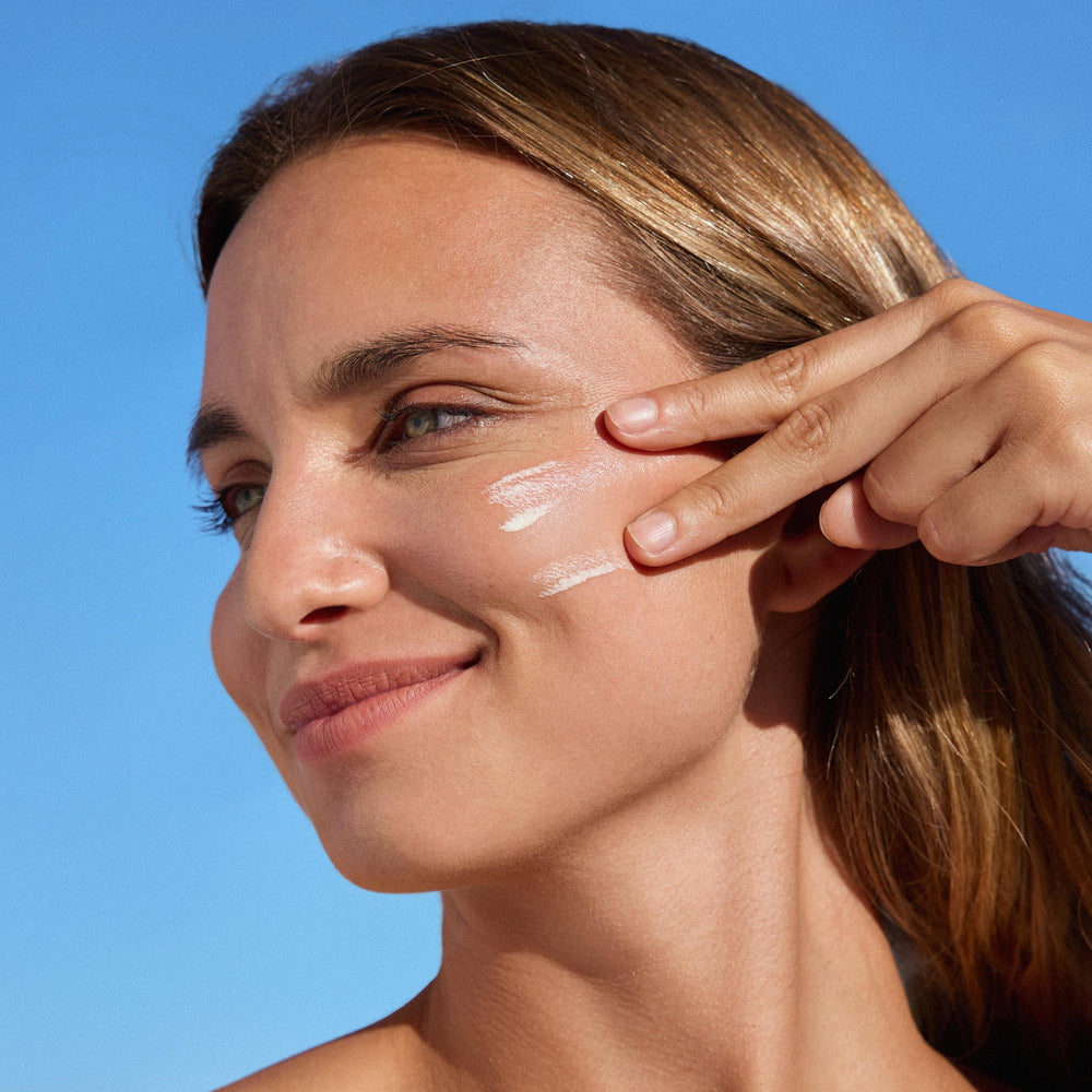 ISDIN sunscreen close-up shows a smooth, quick-absorbing finish.