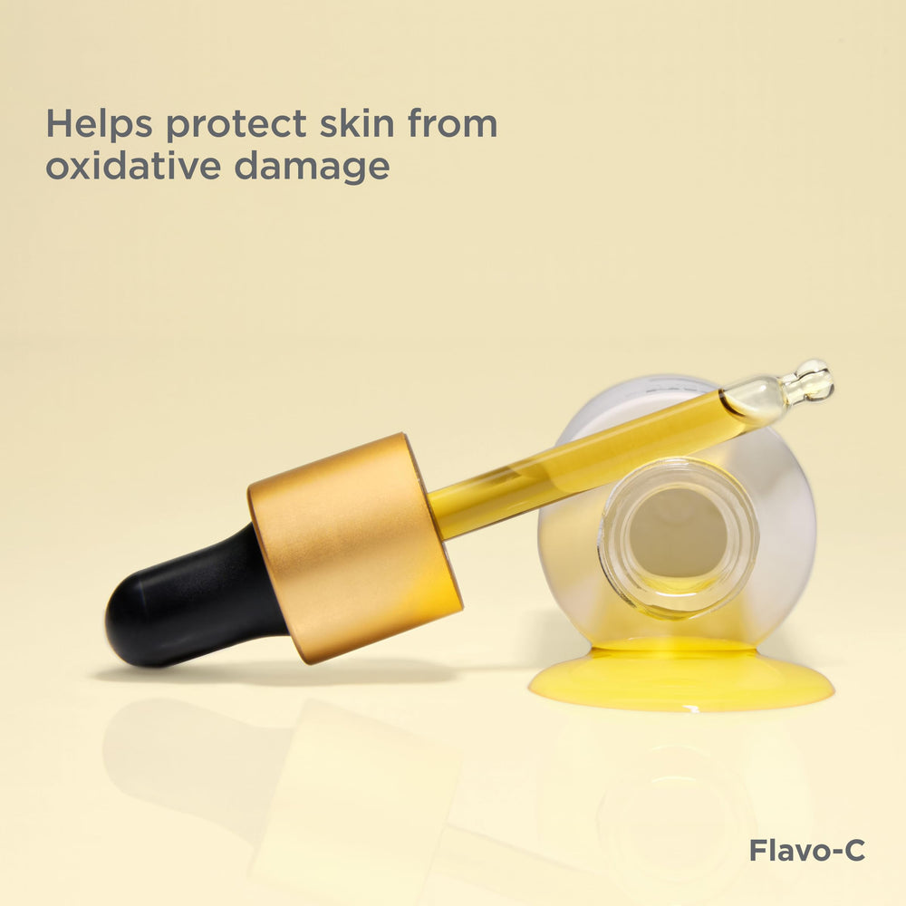 ISDIN Flavo-C brightening glow on cheek illustrates radiant, even-toned skin potential.