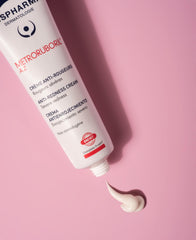 IsisPharma Metroruboril cream swirl texture closeup highlighting calming hydration.