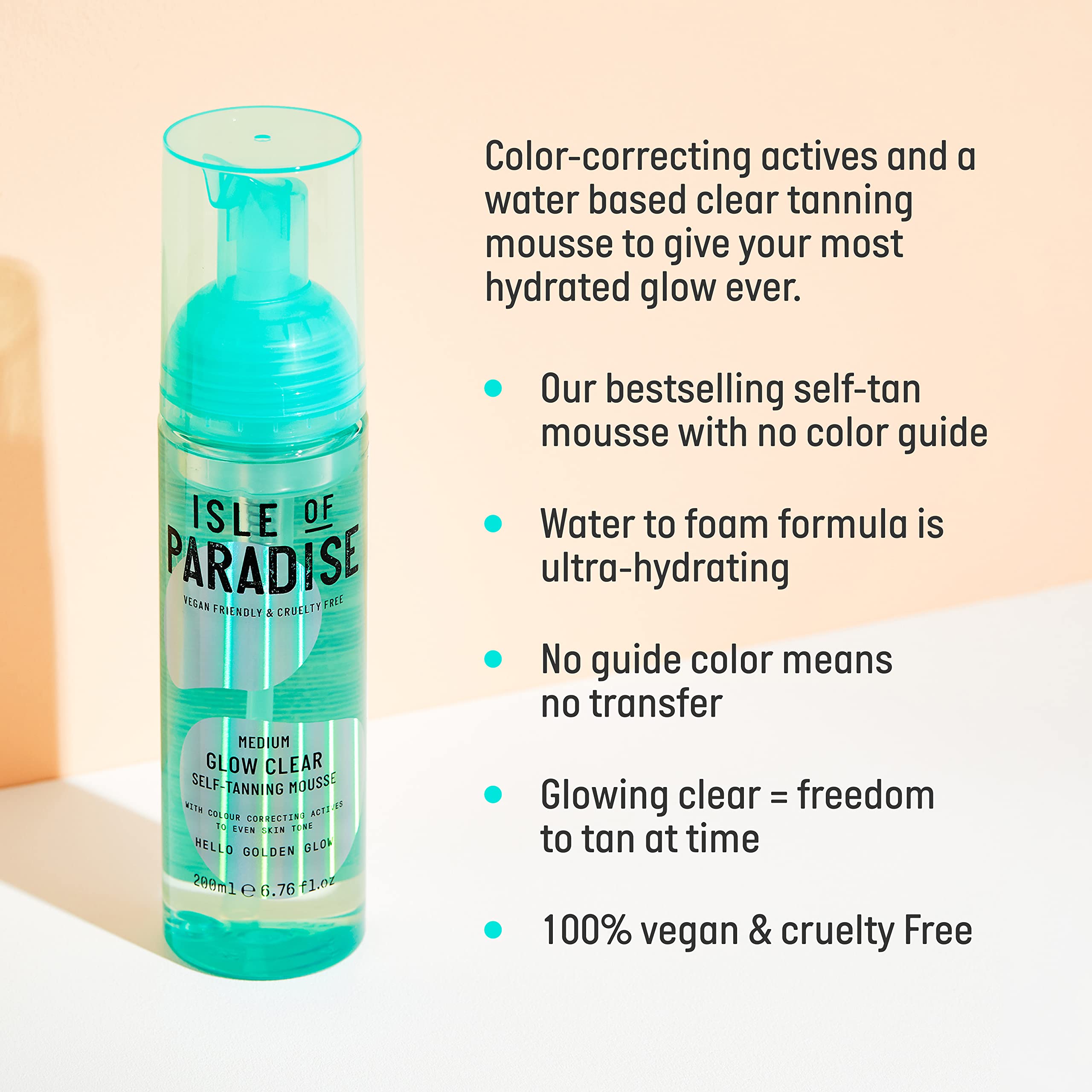 Isle of Paradise Glow Clear Self-Tanning Mousse with application mitt for smooth, streak-free application.