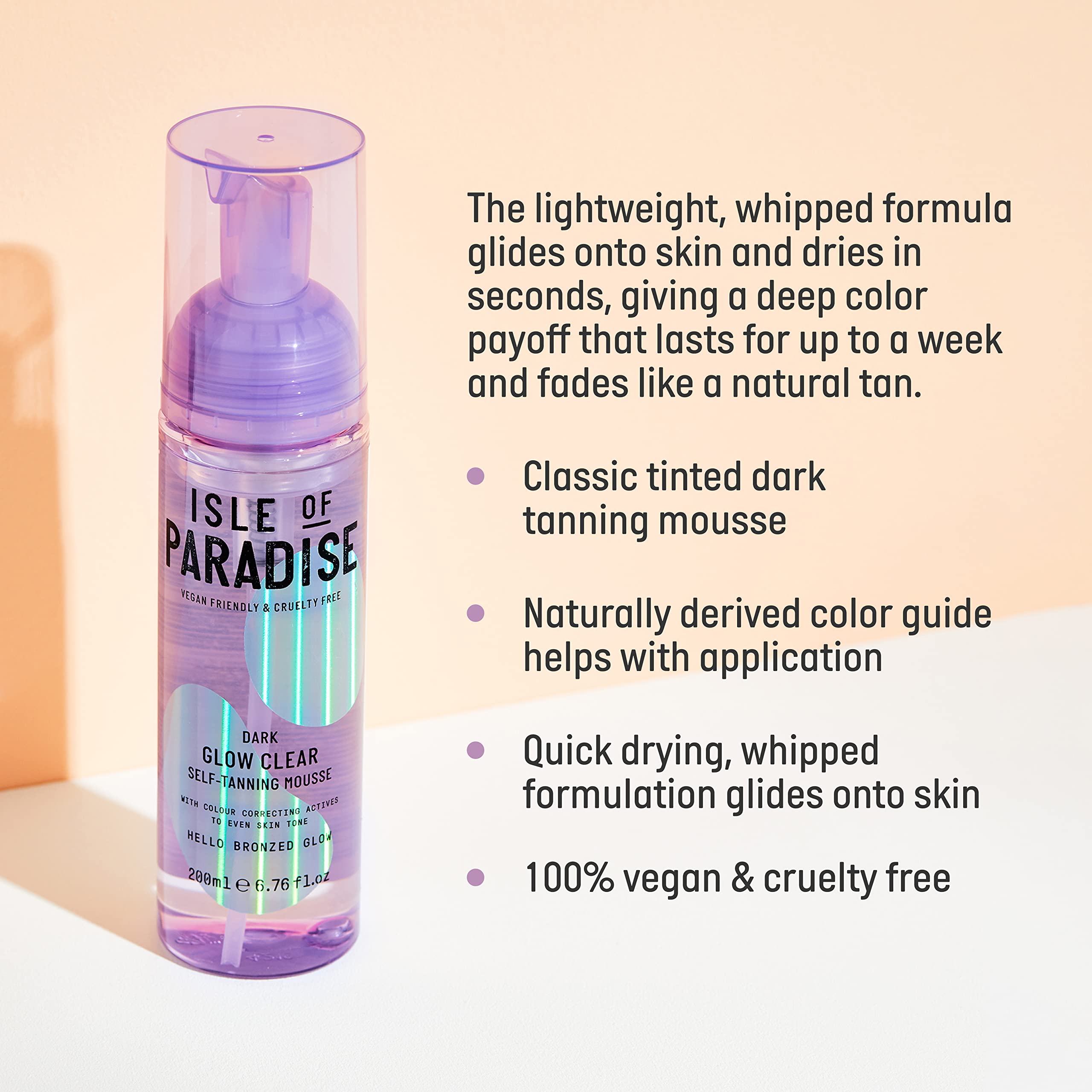 Isle of Paradise Glow Clear Self-Tanning Mousse with application mitt for streak-free results.