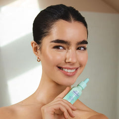 Isle of Paradise self-tanning drops bronze tint swatch on skin showing even tone potential