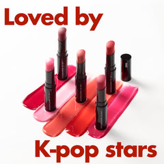 ISOI glossy pink lip balm cap close-up reveals natural tint for daily vitality.