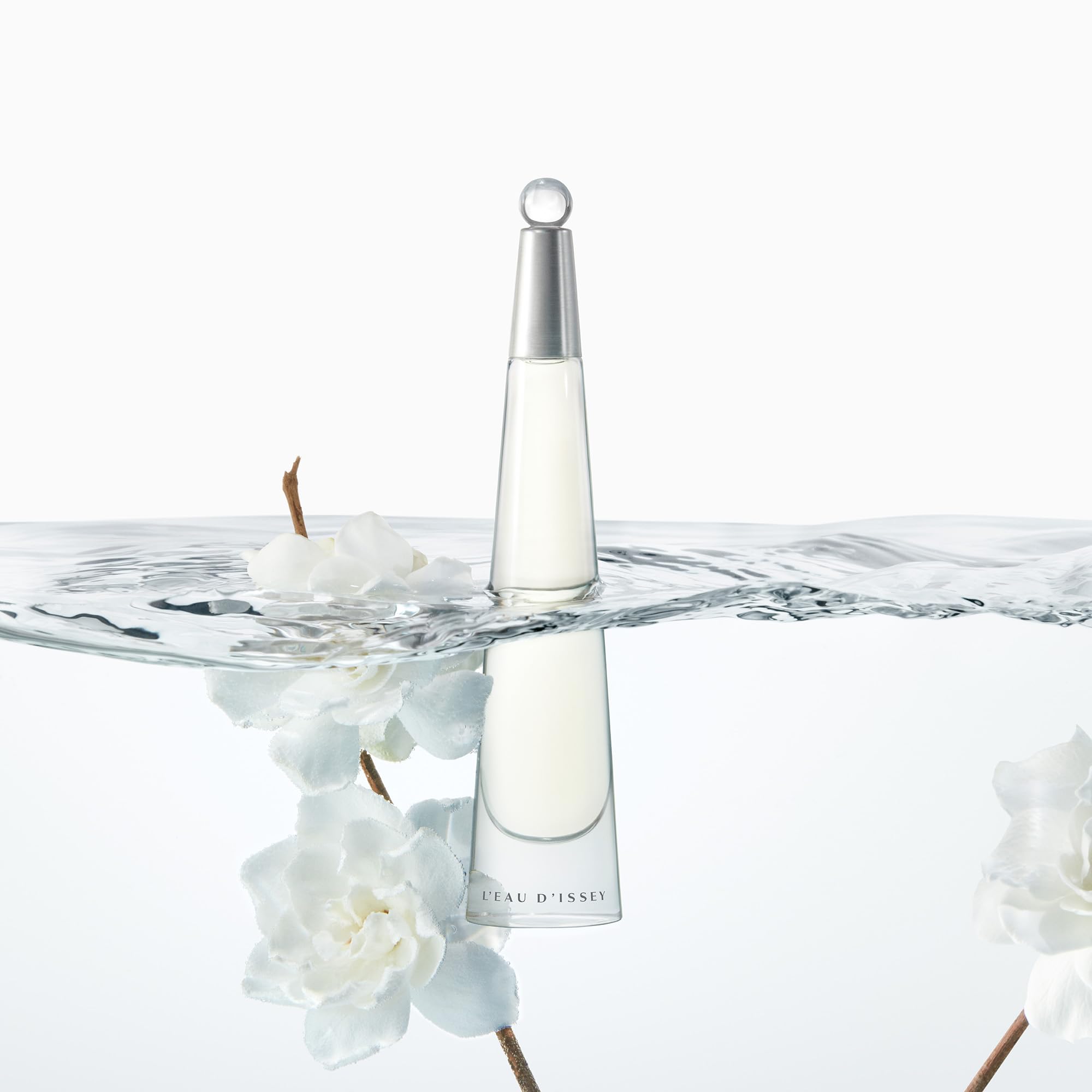 Issey Miyake L'Eau d'Issey sleek silhouette captures refined design for vanity display.