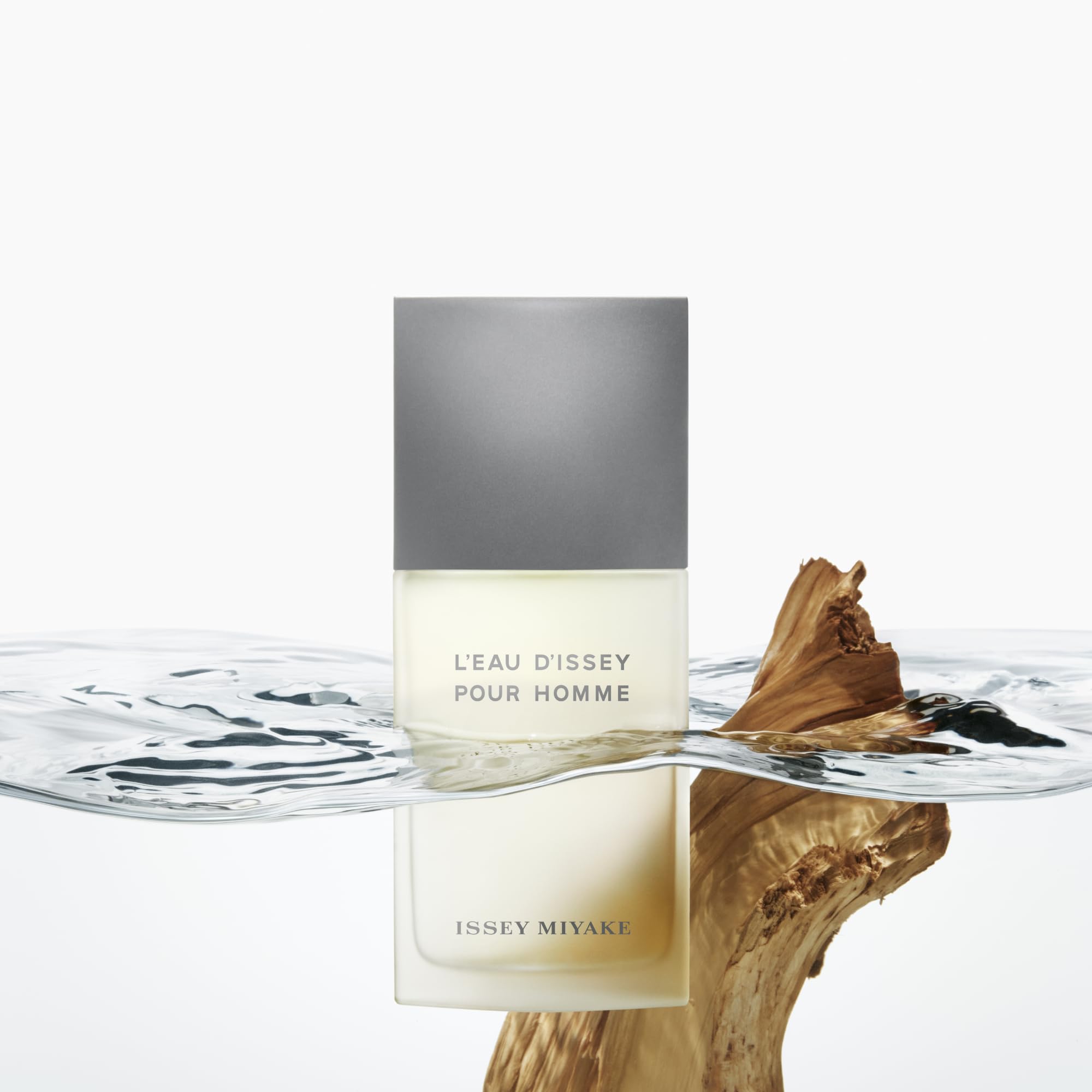 Issey Miyake Pour Homme sandalwood note closeup evokes woody depth for evenings.