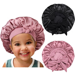 Isshin Beauty satin-silk kids bonnet close-up—soft finish protects delicate hair overnight.