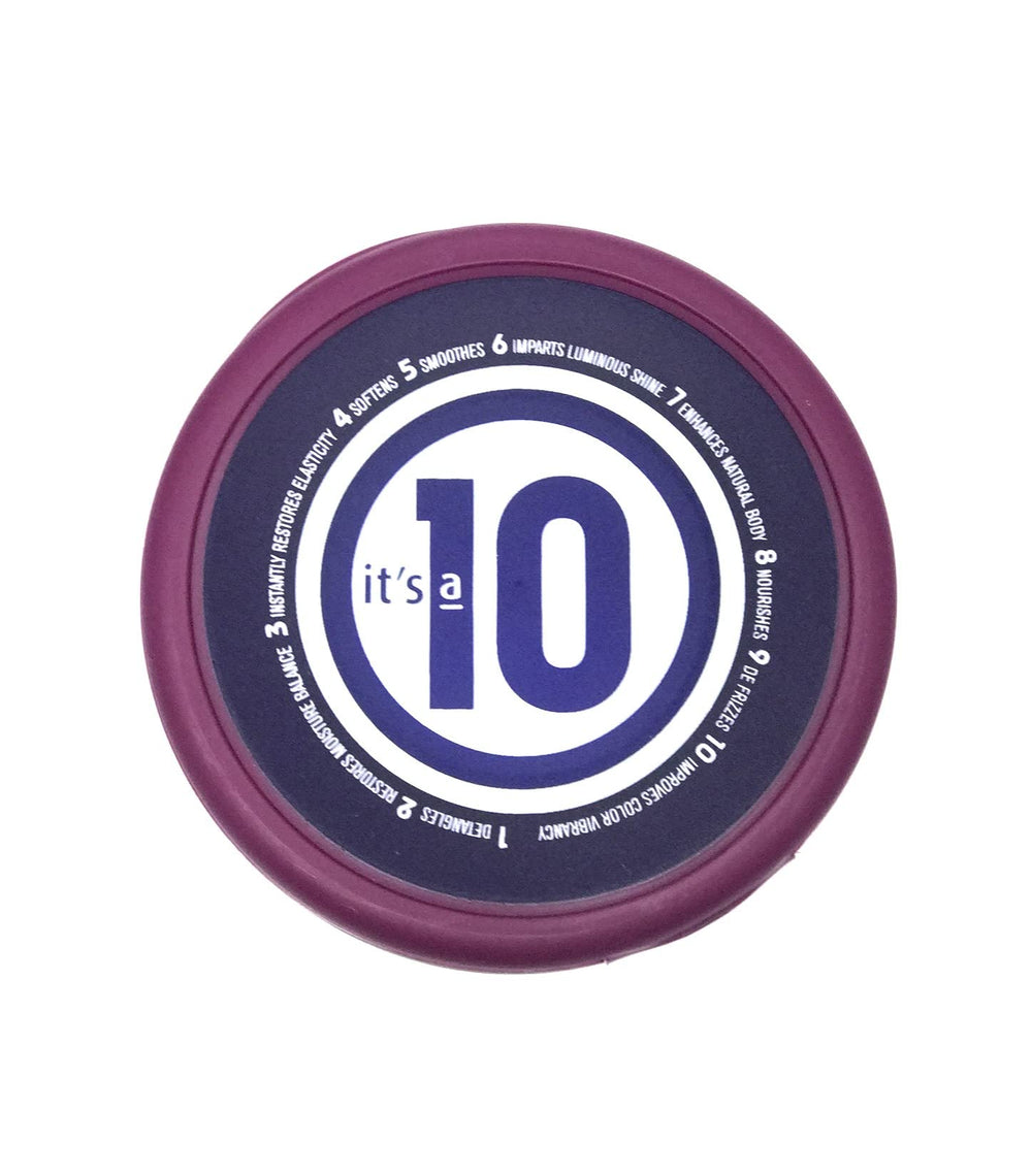 It's a 10 Miracle Hair Mask application hand demonstrating detangling boost.