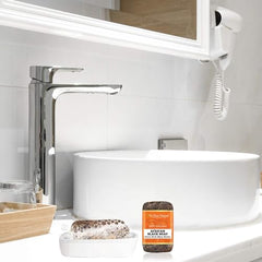 It's Pure Natural African Black Soap ingredients close-up highlights shea butter and cocoa pods for nourishment.