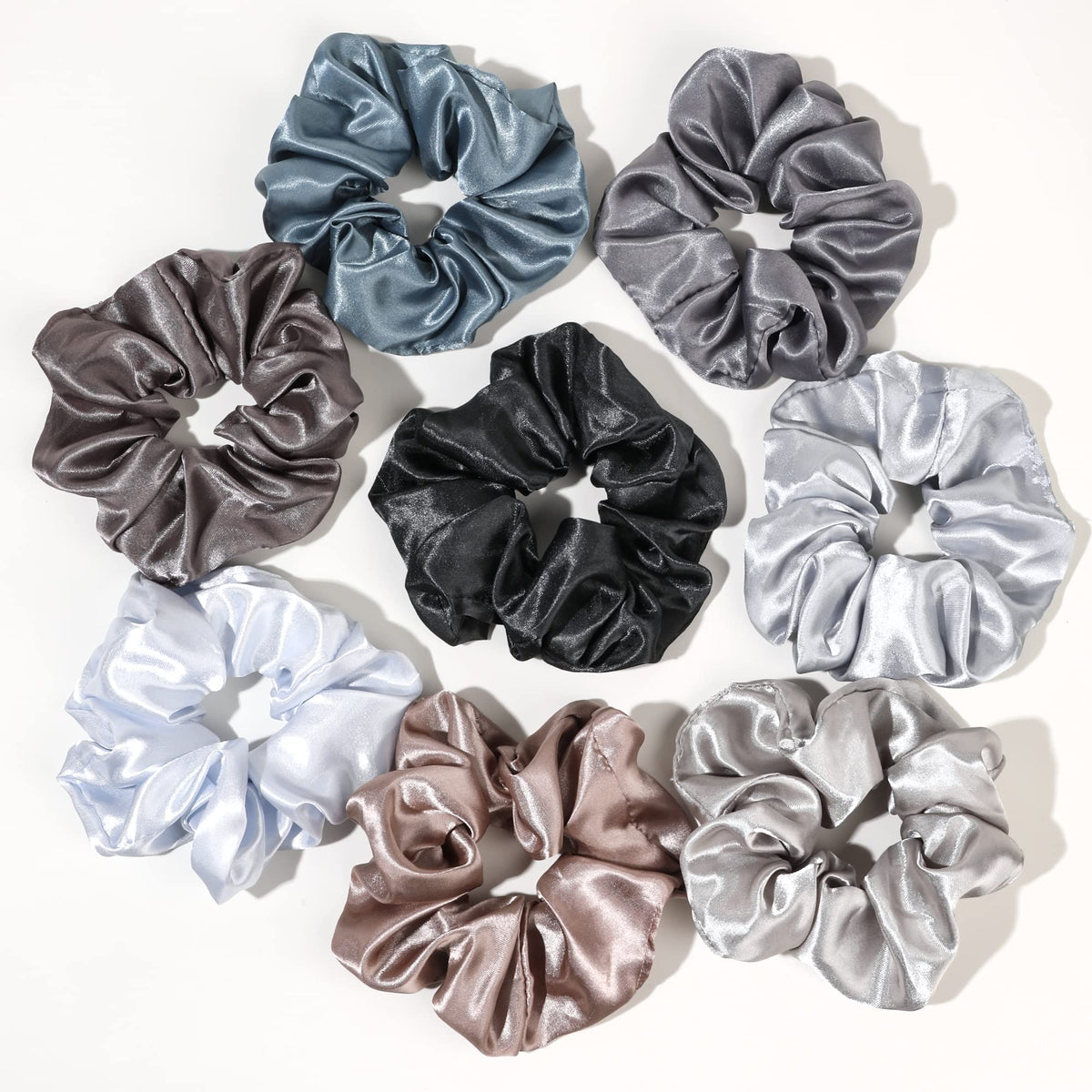 Ivyu satin scrunchies 8-pack on hair demonstrate secure hold with gentle pull.