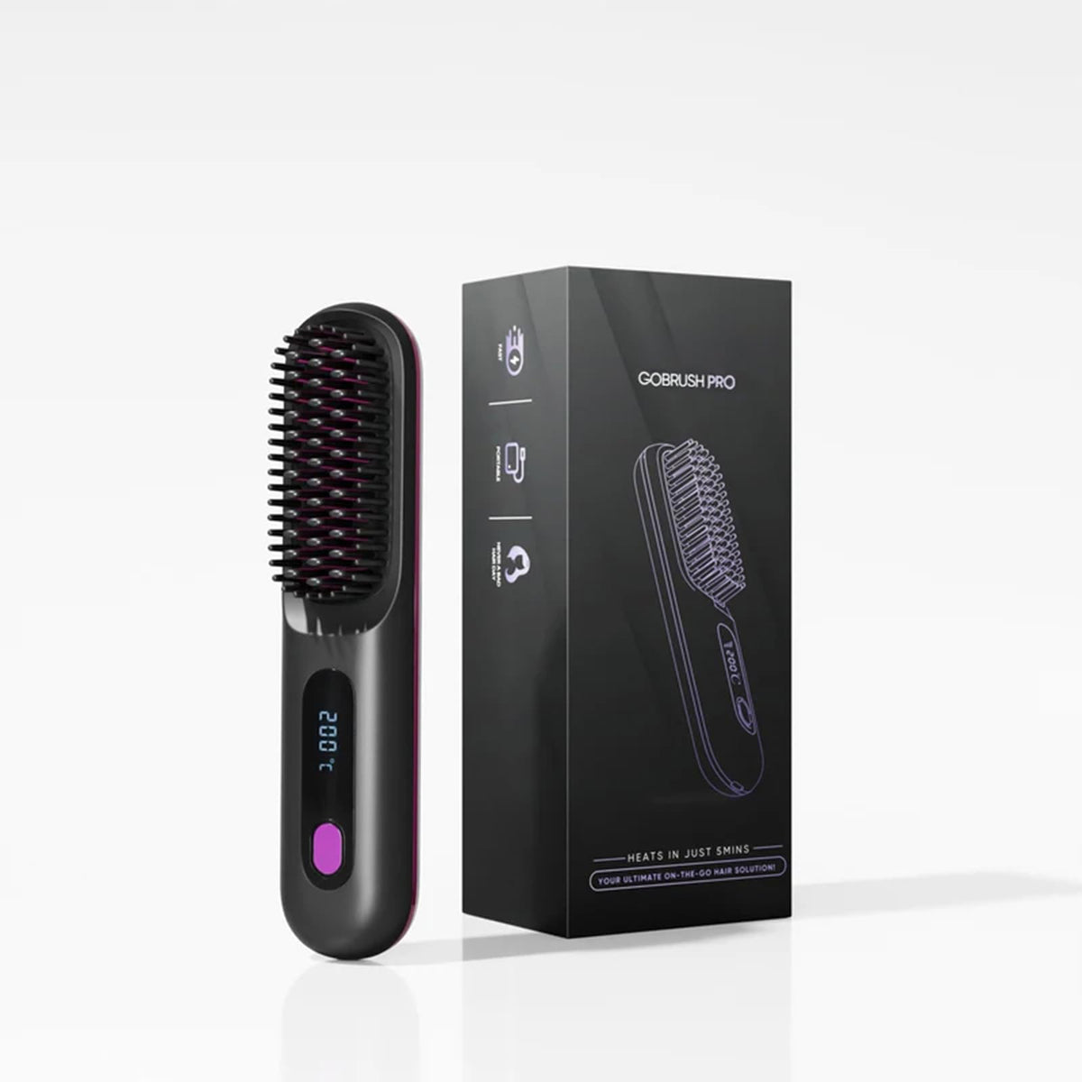 IZRIO Go Brush Pro 2025 in hand for on-the-go styling convenience.