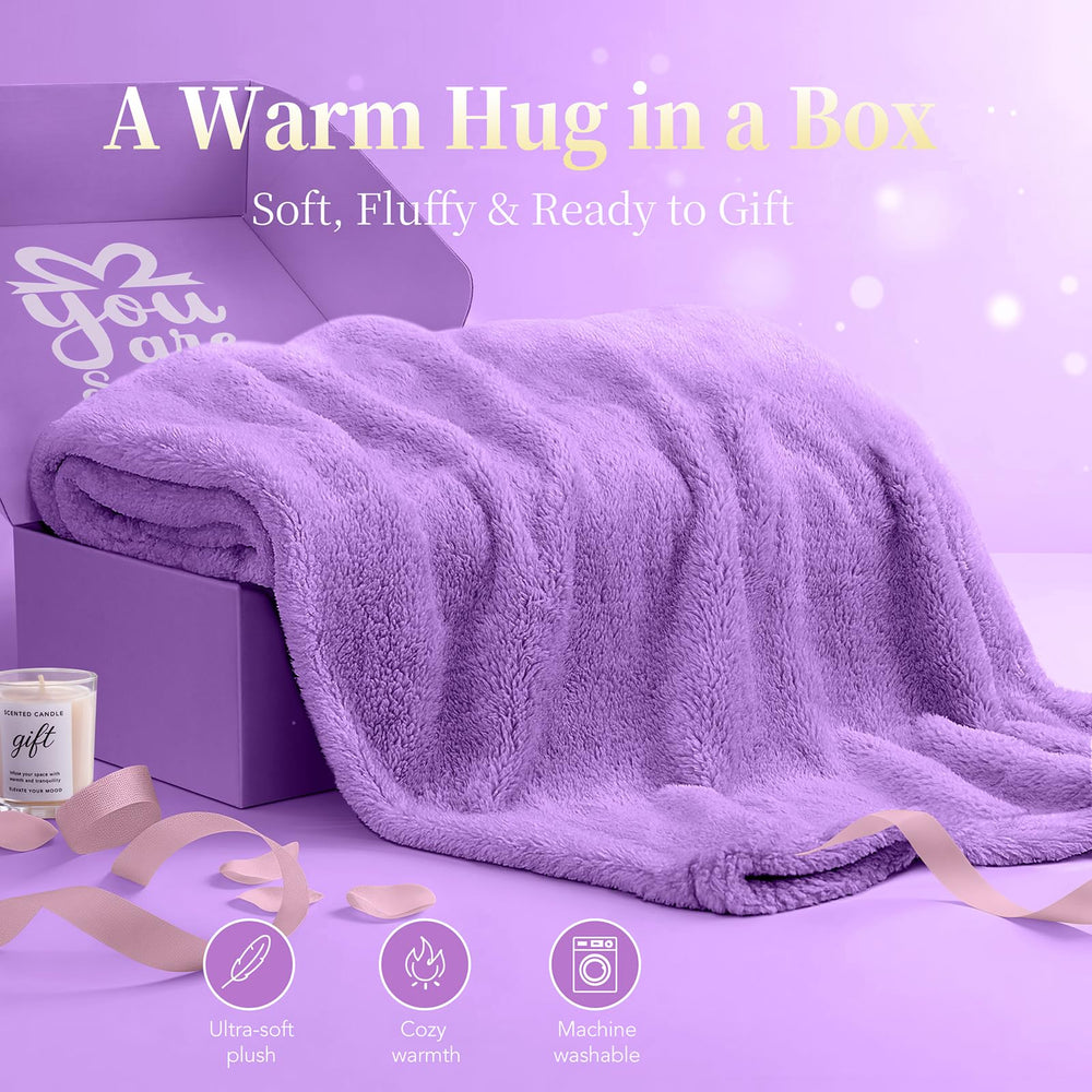 IZZUBIZ purple cozy blanket drapes you in warmth during quiet evenings.