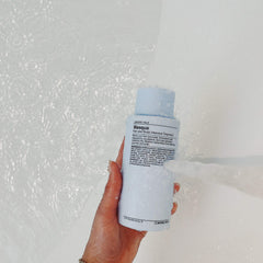 J Beverly Hills Blue Hair Mask jar shows premium formula for detangling and shine.