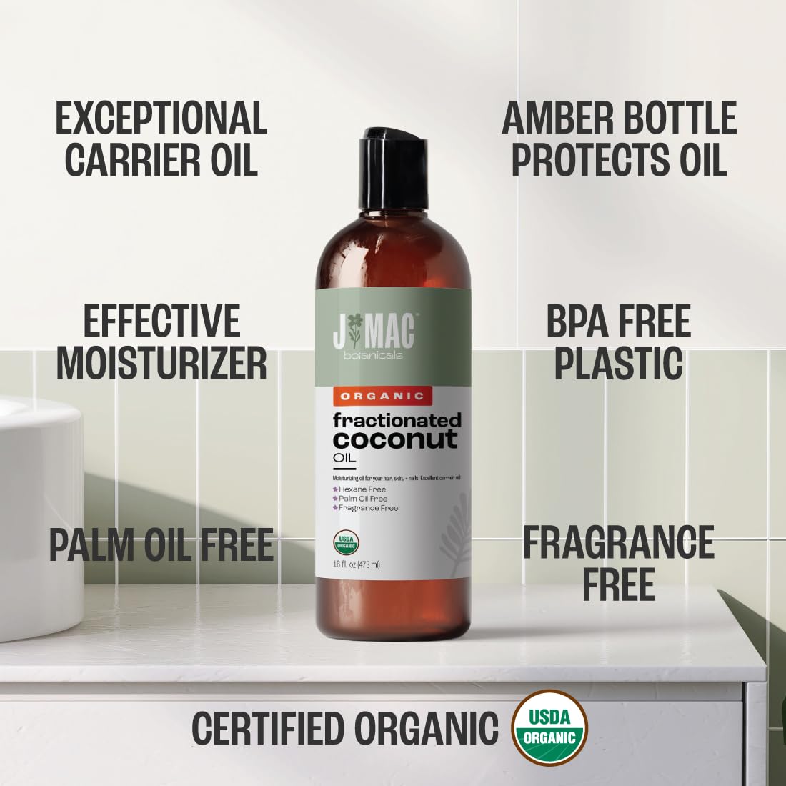 J MAC Botanicals coconut oil texture close-up shows light, clear carrier oil