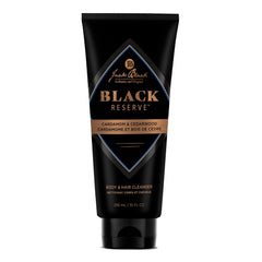 Jack Black Black Reserve bottle closeup shows dual-action cleansing for skin and hair
