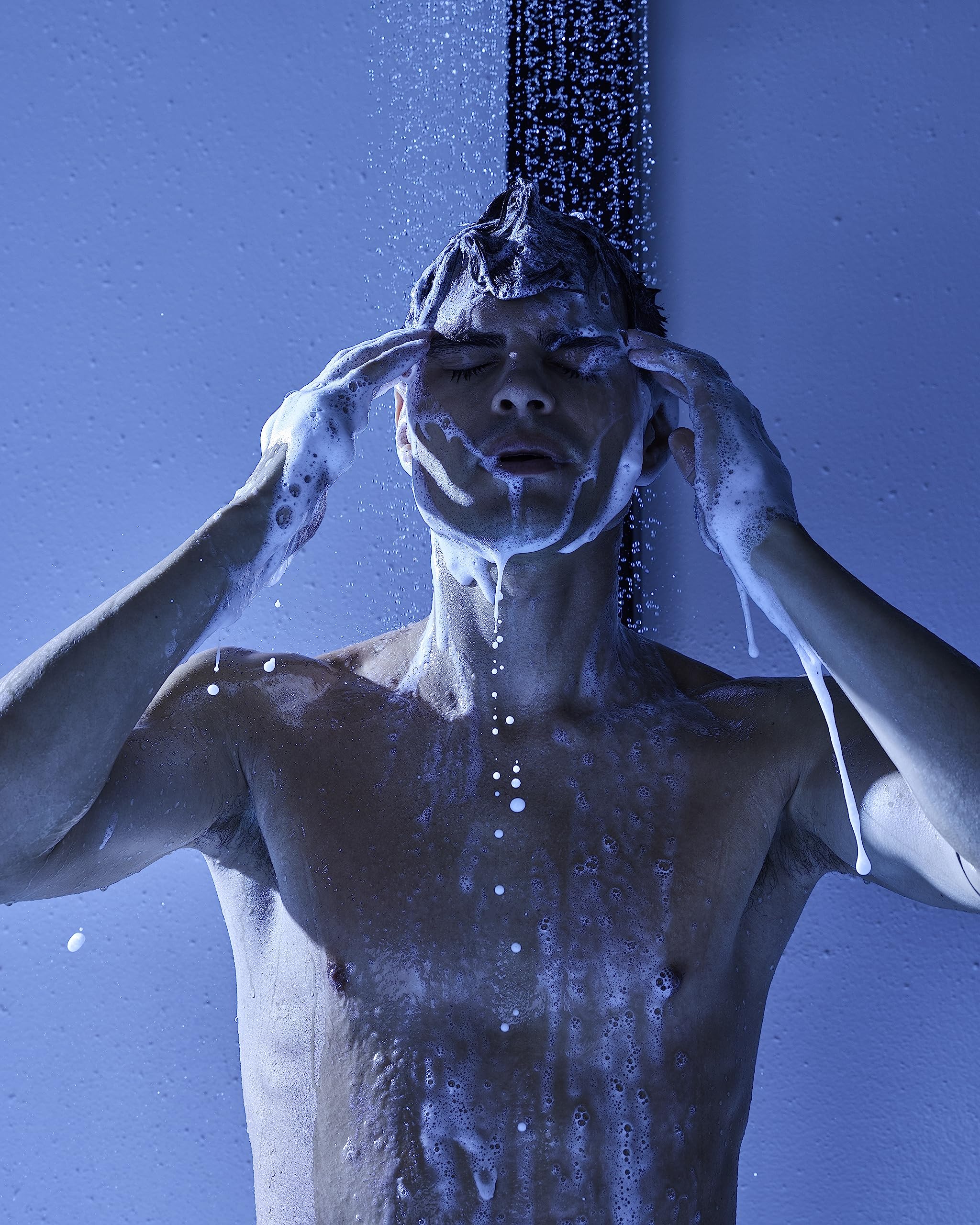 Jack Black Blue Midnight shower-scene highlights convenient, one-step wash for skin and hair.