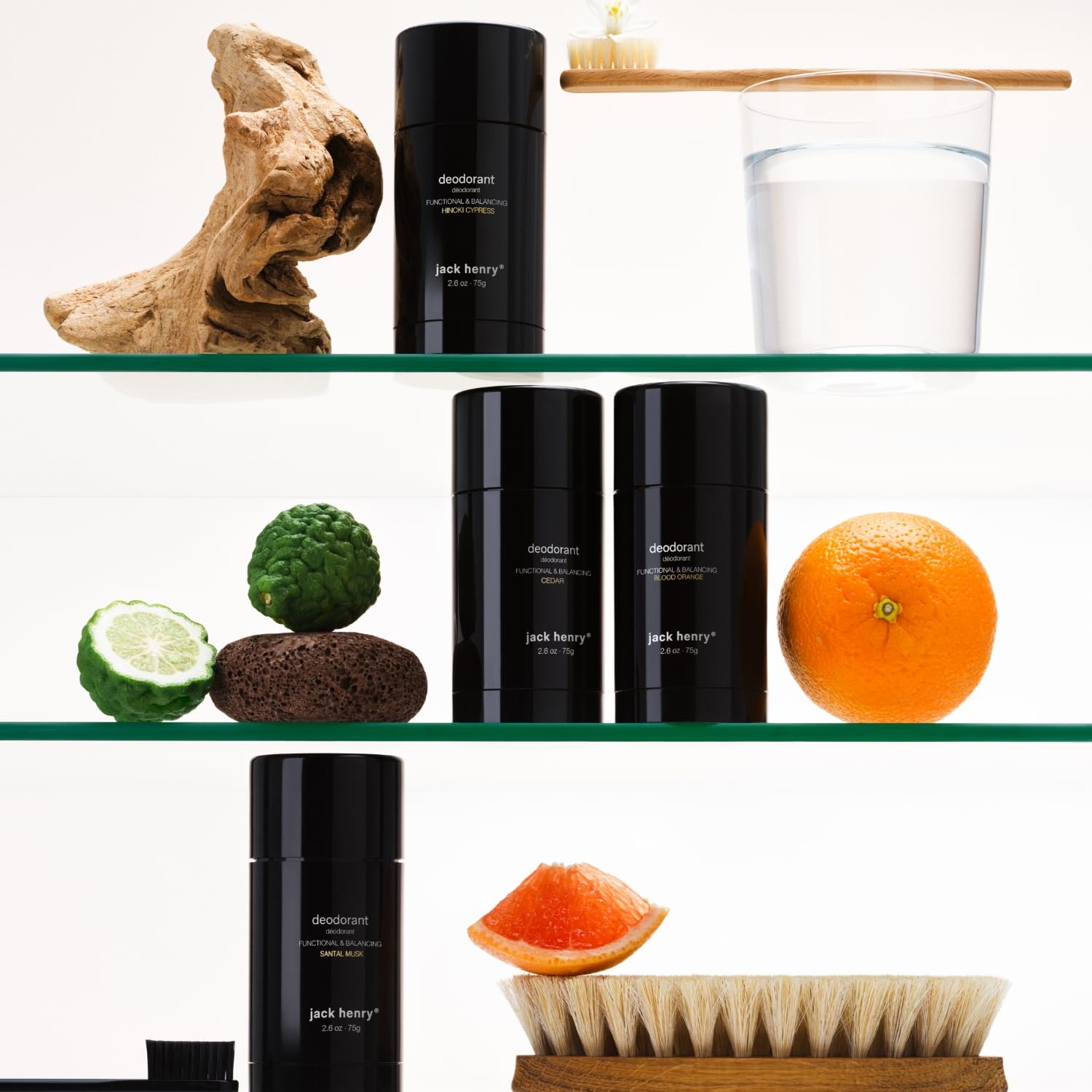 Four-scent display featuring Cedar and other botanical options.