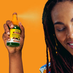 Jamaican Mango & Lime Love Your Locs spray being misted to refresh locs and braids between washes