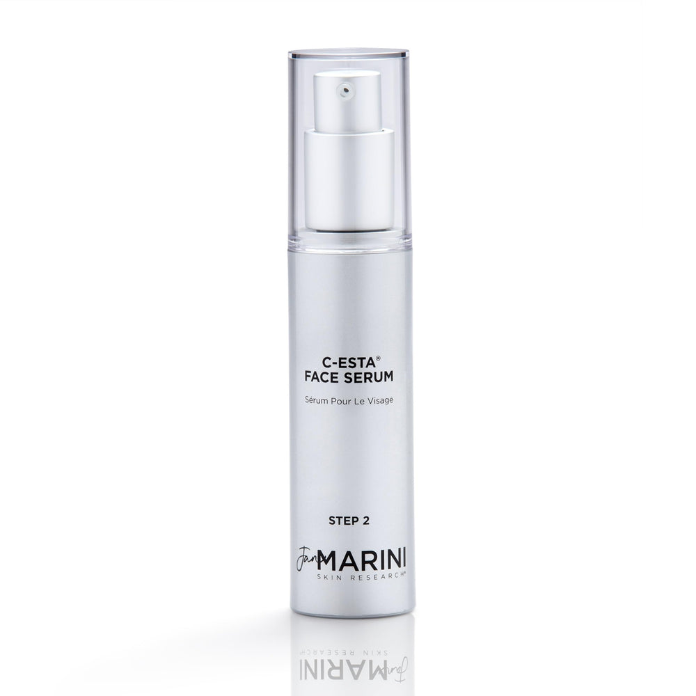 Jan Marini C-ESTA Serum bottle on a clean vanity for daily antioxidant hydration.