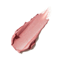 Jane Iredale Glow Time Blush Stick swatch on cheek delivering natural radiance.