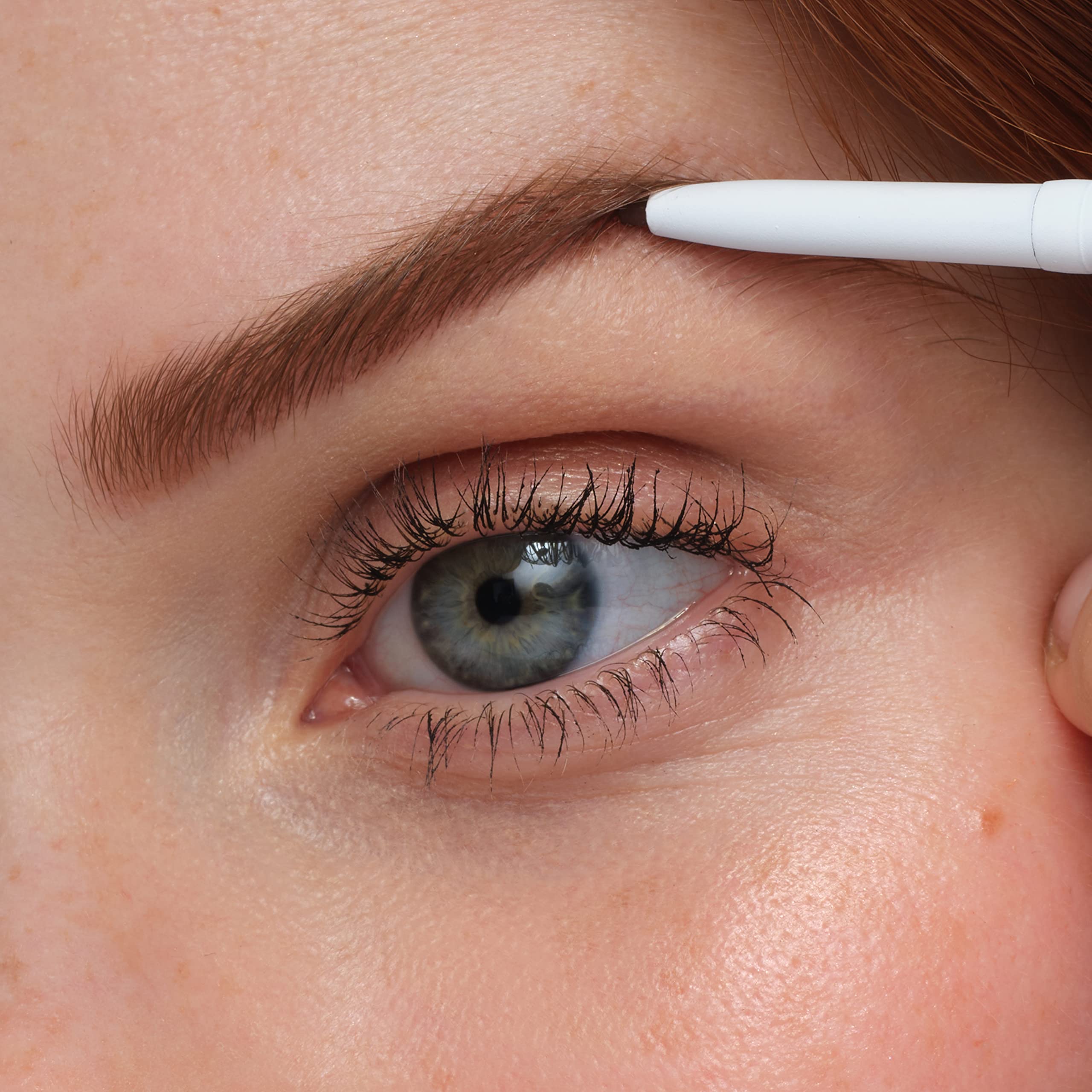Jane Iredale PureBrow application close-up demonstrates precise grooming.
