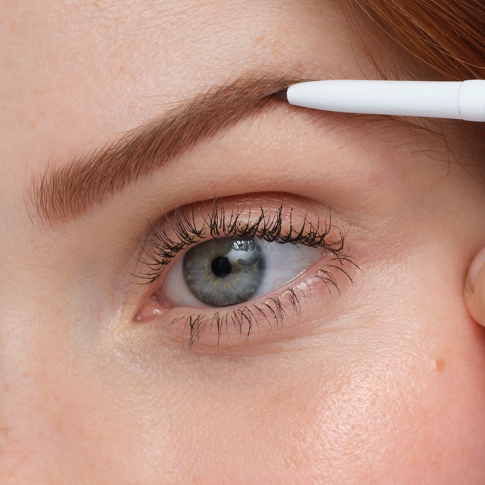 Jane Iredale PureBrow application close-up demonstrates precise grooming.