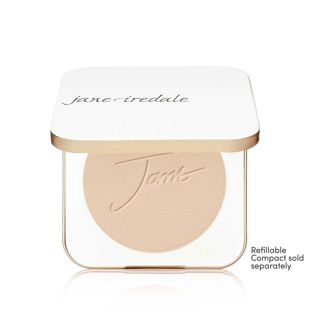 Jane Iredale PurePressed Base applying with brush for quick touch-ups.