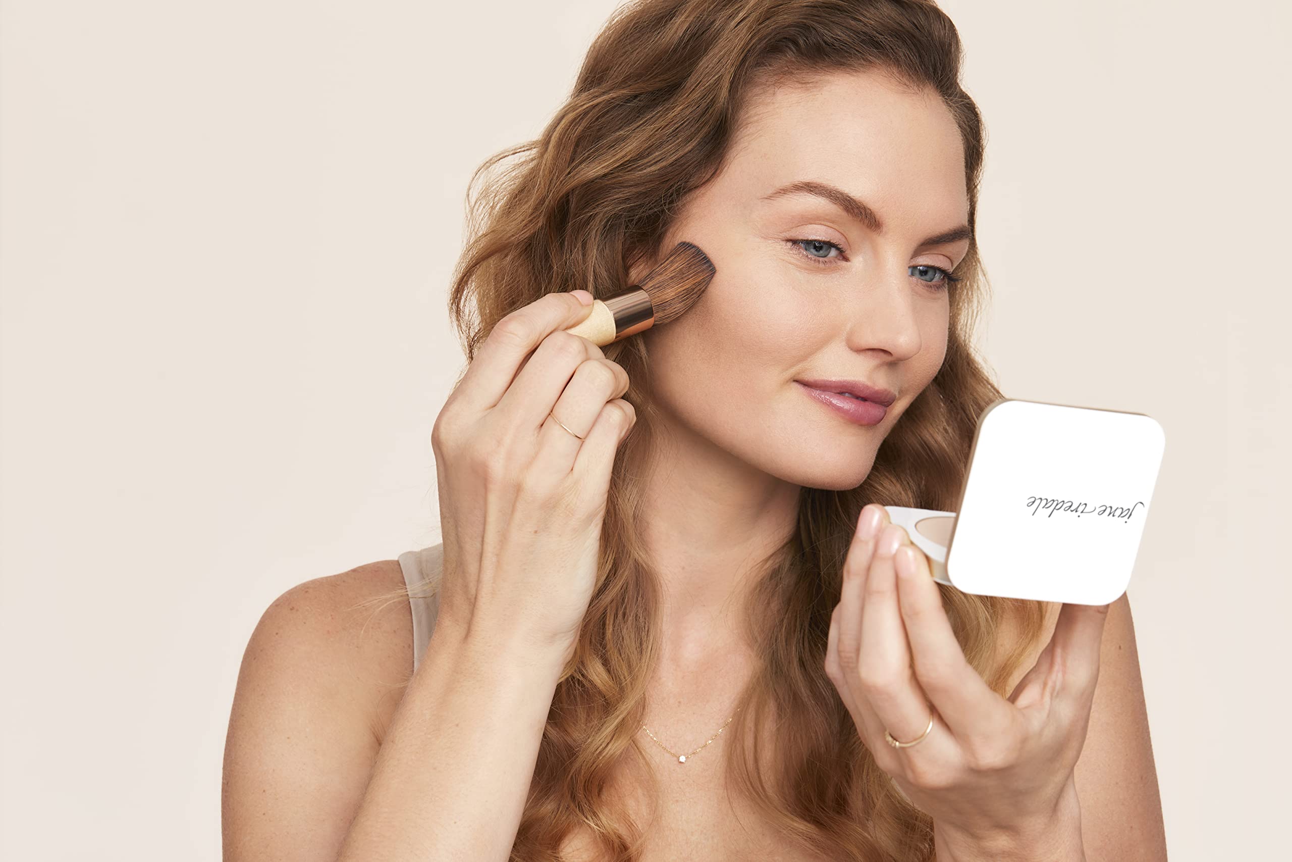 Jane Iredale PurePressed Base water resistance indicates longer wear in humidity.