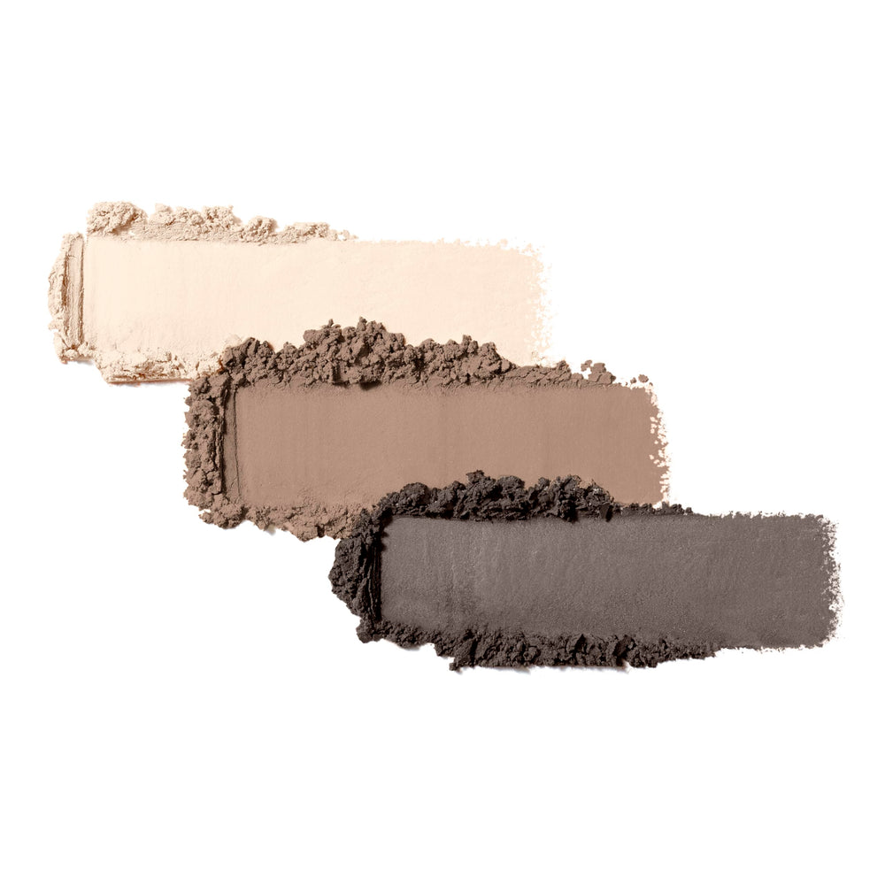 Jane Iredale PurePressed Eye Shadow Triple Riverstone palette close-up highlights soft, buttery texture for easy blending.