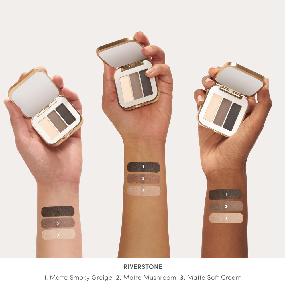 Jane Iredale PurePressed Eye Shadow Triple Riverstone swatch on skin demonstrates true color and depth.