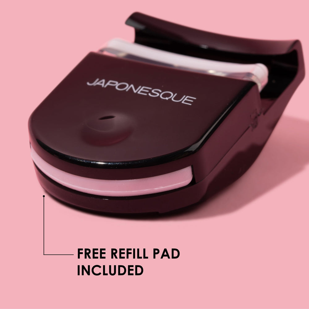 JAPONESQUE Travel Eyelash Curler base squeeze yields deep curl with a five-second technique.