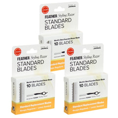 Jatai Feather styling razor blade close-up with a sharp edge for precise cuts.