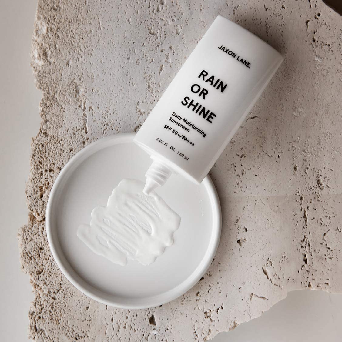 JAXON LANE Rain or Shine ginseng extract label indicating elasticity support potential.