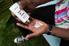 JAXON LANE Rain or Shine hyaluronic acid closeup highlighting hydrating feel.