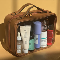JAZD Clear Makeup Bag showcasing saffiano leather accents for durable, stylish travel